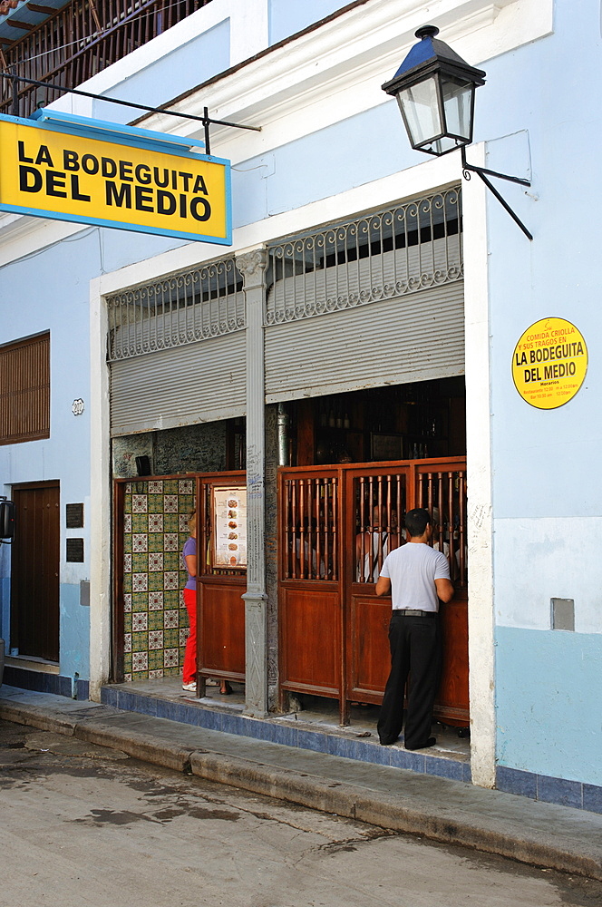 The Bodeguita del Medio, a popular restaurant-bar and music venue, made famous by Ernest Hemingway, in Calle Obispo in historic centre, Old Havana (Habana Vieja), Havana, Cuba, West Indies, Central America