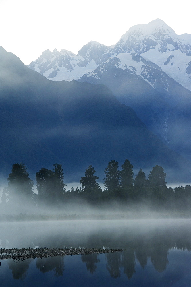 Lake Matheson and Mount Tasman in early morning mist, South Island, New Zealand, Pacific