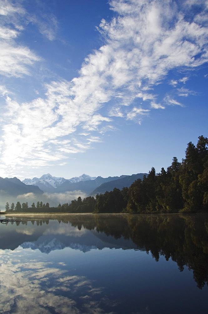 Lake Matheson reflecting a near perfect image of Mount Tasman and Aoraki (Mount Cook), 3754m, Australasia's highest mountain, Southern Alps, South Island New Zealand, Pacific