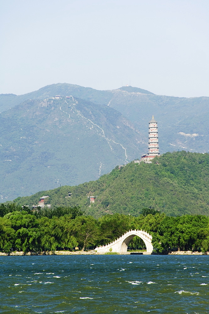 A pagoda on Yuquan Mountain seen across Kunming Lake at Yihe Yuan (The Summer Palace), UNESCO World Heritage Site, Beijing, China, Asia