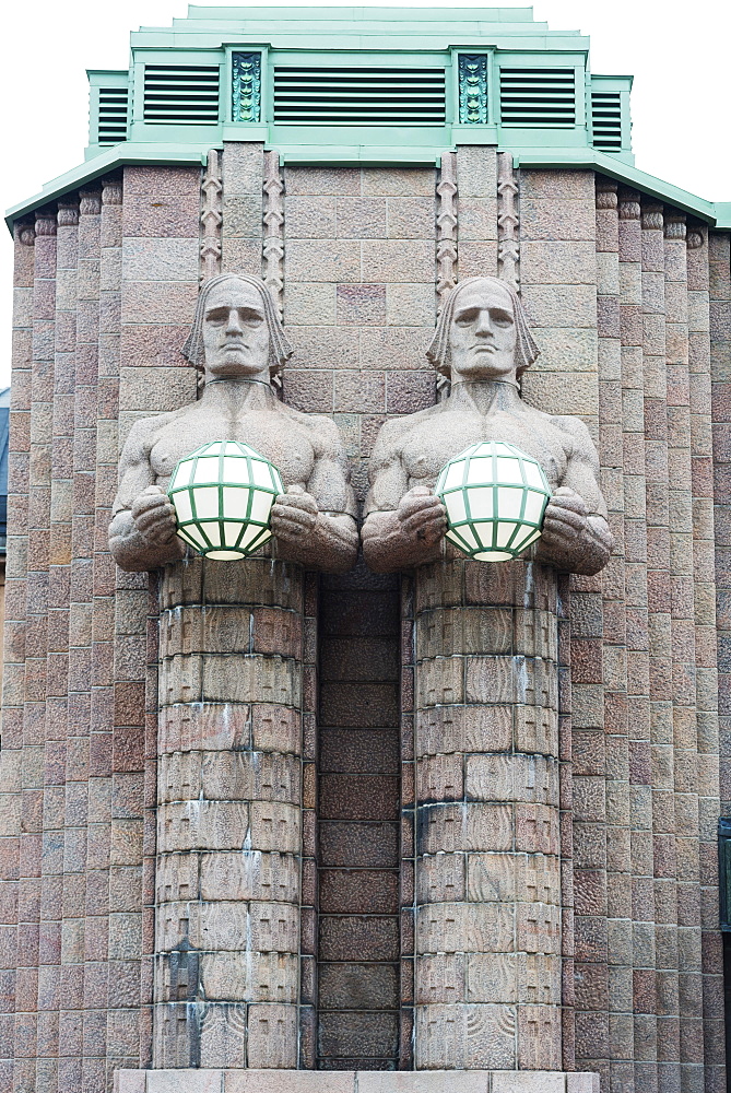 Art nouveau statues designed by Emil Wikstrom at Rautatieasema Train Station, Helsinki, Finland, Scandinavia, Europe