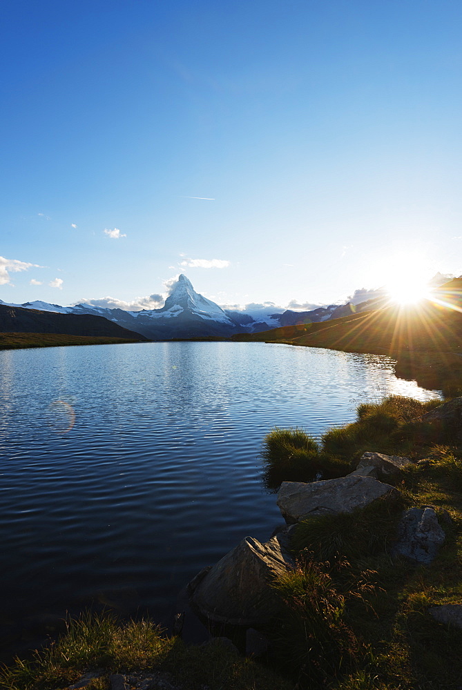 The Matterhorn, 4478m, and Stellisee lake at sunset, Zermatt, Valais, Switzerland, Europe