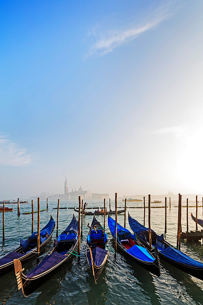 Gondola and San Giorgio Maggiore Church across Basino di San Marco, Venice, UNESCO World Heritage Site, Veneto, Italy, Europe