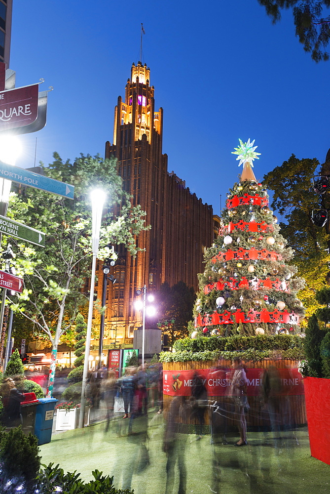 Christmas tree and decorations with Manchester Unity Building at City Square, Melbourne, Victoria, Australia, Pacific