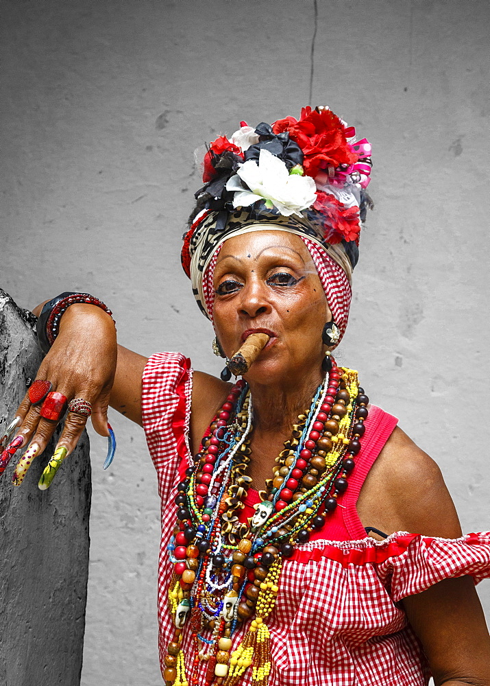 Woman smoking cigar, old Havana, Cuba, West Indies, Caribbean, Central America