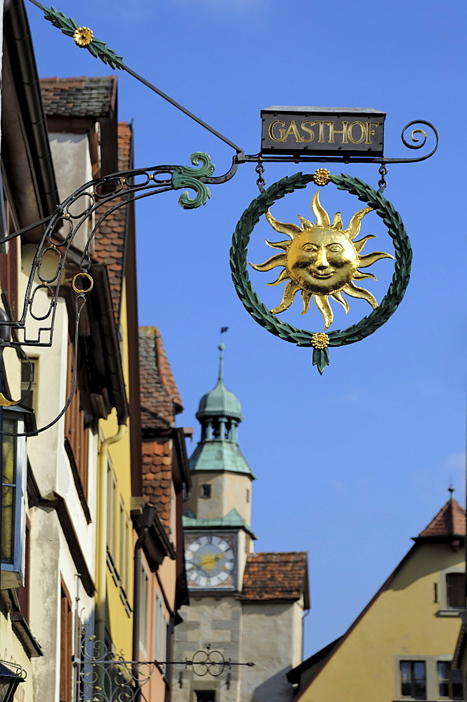 Ornate wrought iron shop sign advertising a gasthof (guesthouse), Rothenburg ob der Tauber, Bavaria (Bayern), Germany, Europe