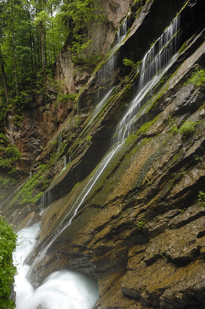 Swirling glacial water carves through Wimbachklamm gorge, near Ramsau, Berchtesgaden National Park, Bavaria, Germany, Europe