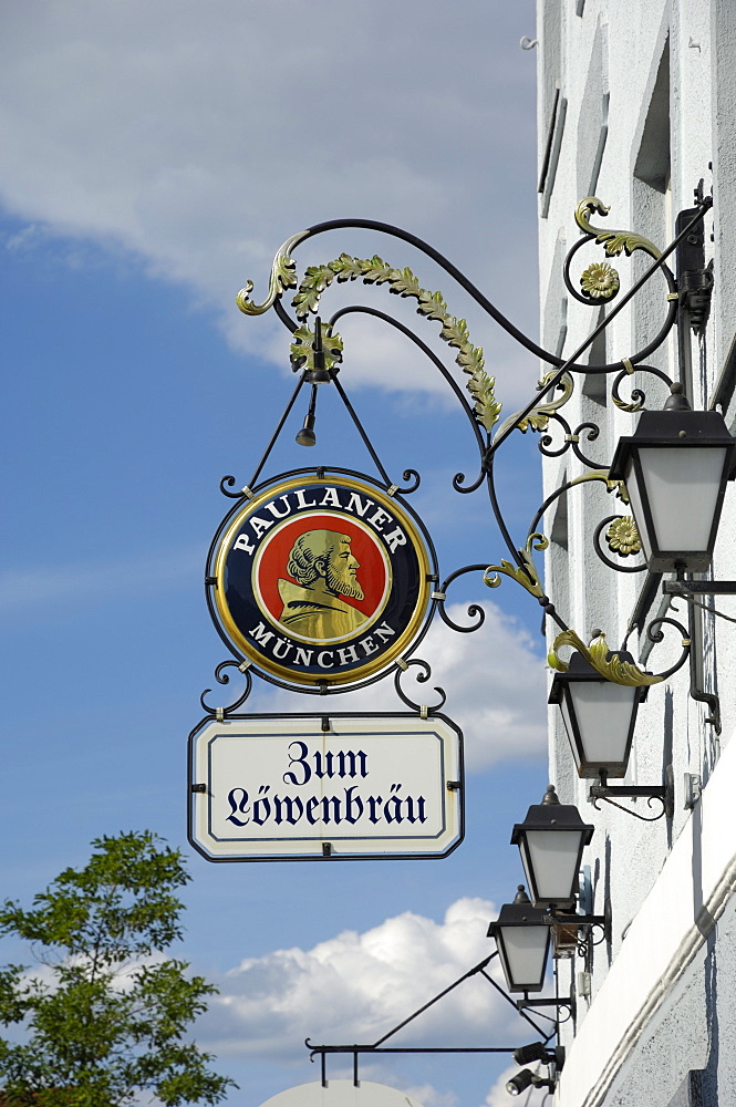 Wrought iron sign advertising Paulaner and Lowenbrau beer, Wolfrathausen, near Munich, Bavaria, Germany, Europe