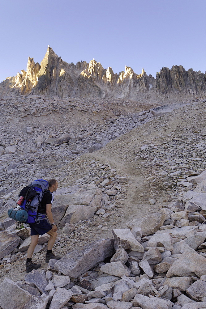 Hiking through lunar landscape up to Cramer Divide, Sawtooth Mountains, Sawtooth Wilderness, Sawtooth National Recreation Area, Rocky Mountains, Idaho, United States of America, North America