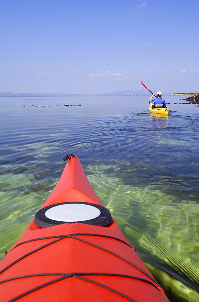 Sea kayaking near Arisaig, Highlands, Scotland, United Kingdom, Europe