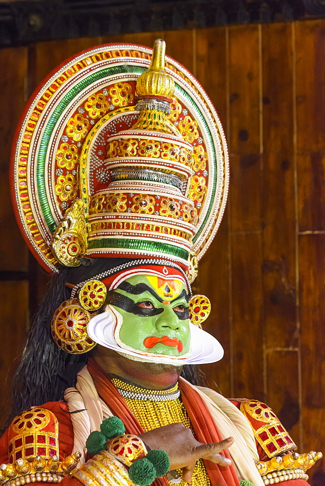 Man in traditional costume during Kerala Kathakali performance in Kochi, Kerala, India, Asia