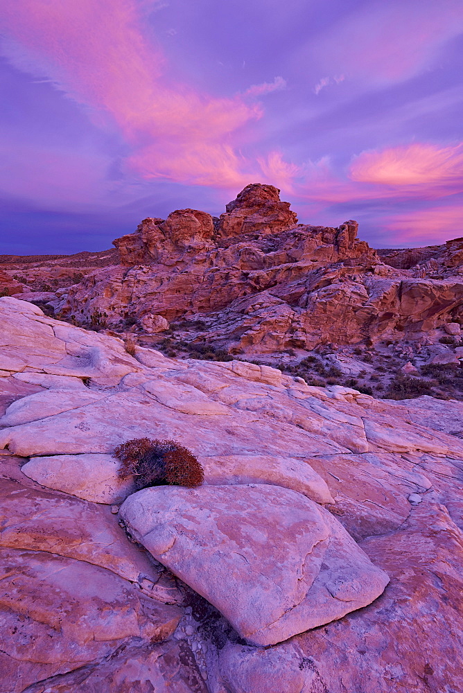 Vibrant orange clouds over red and white sandstone at sunset, Gold Butte, Nevada, United States of America, North America