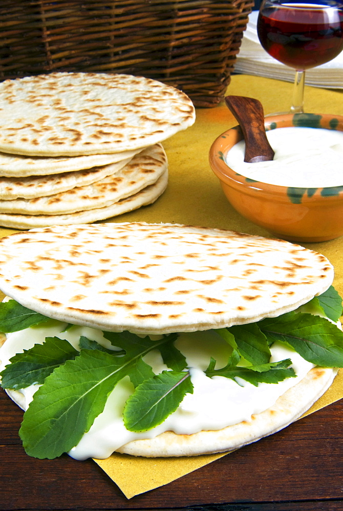 Piadina flat bread with rucola (rocket) and stracchino cheese, typical Emilia Romagna food, Piadina, Emilia Romagna, Italy, Europe