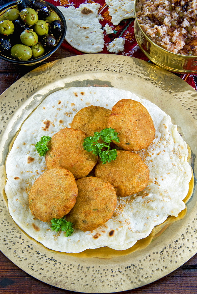 Falafel, a deep-fried balls or patties made from ground chickpeas and or fava beans, Arabic Countries