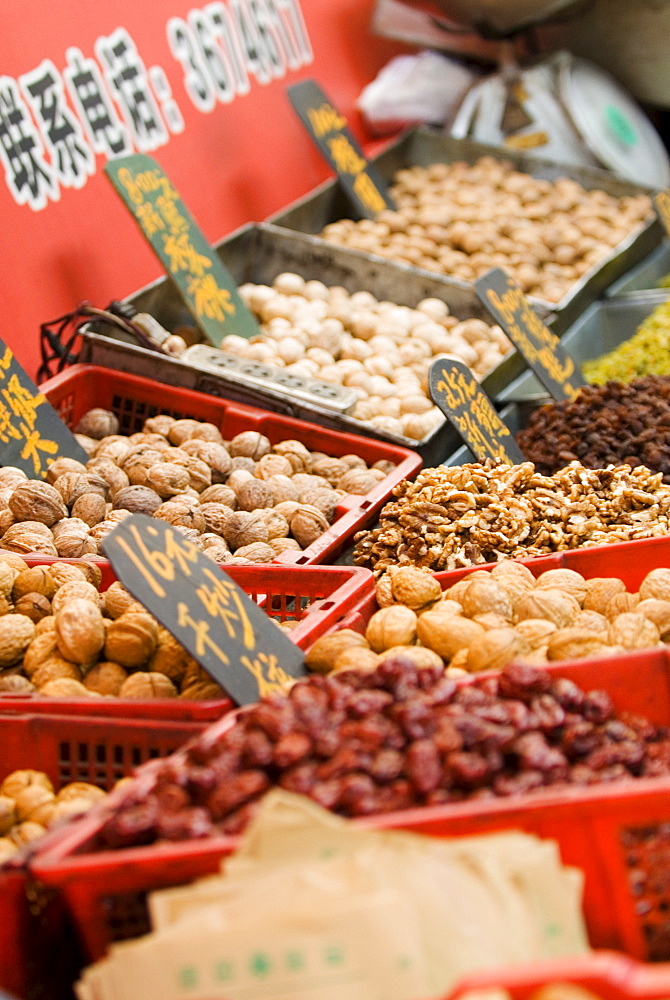 Nuts for sale at market, Xining, Qinghai, China, Asia