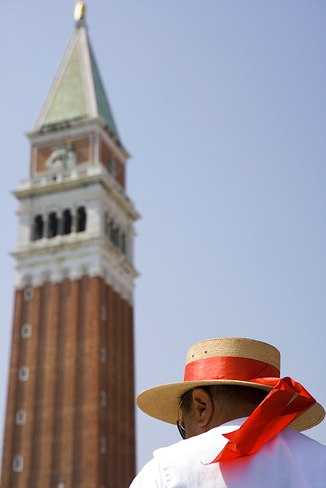 Campanile and gondolier, St. Mark's Square, Venice, Veneto, Italy, Europe