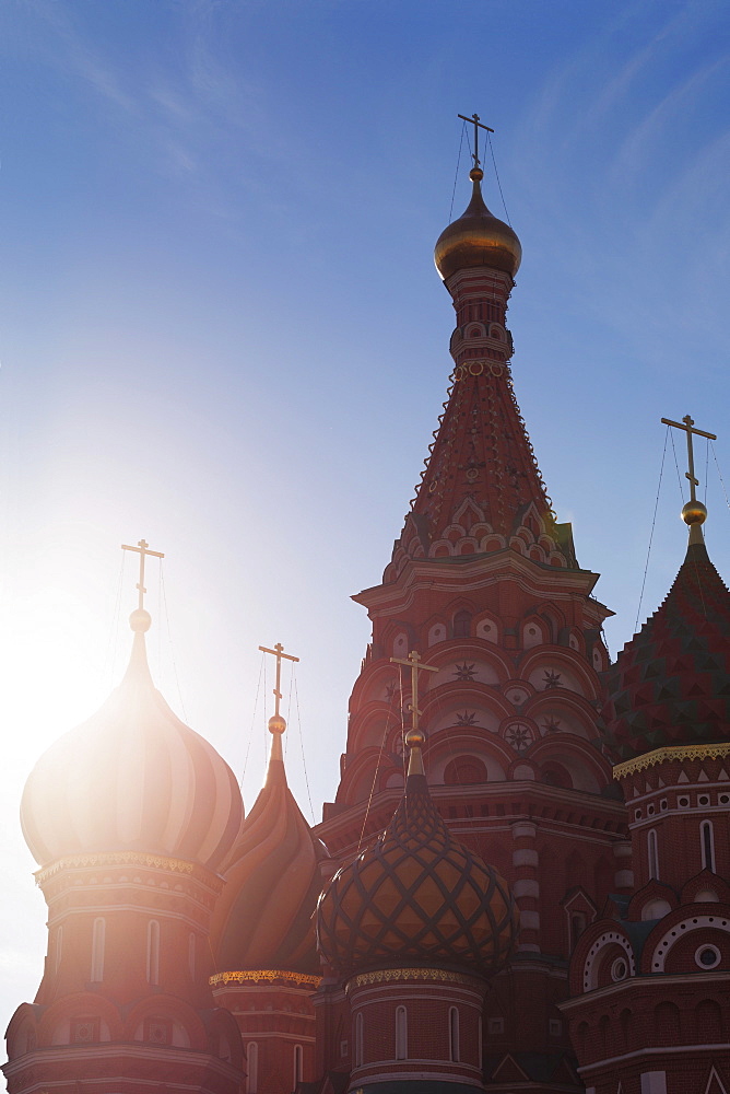 Silhouette of the onion domes of St. Basil's Cathedral in Red Square, UNESCO World Heritage Site, Moscow, Russia, Europepushed red in shadows using curves