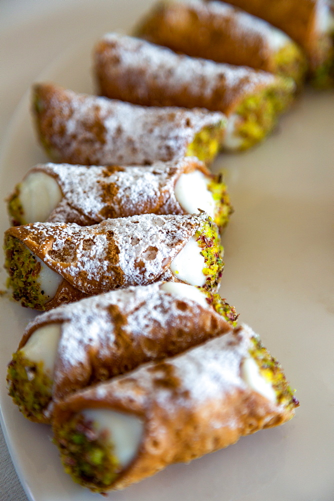 Traditional Sicilian Cannoli arranged on a plate, Sicily, Italy, Europe