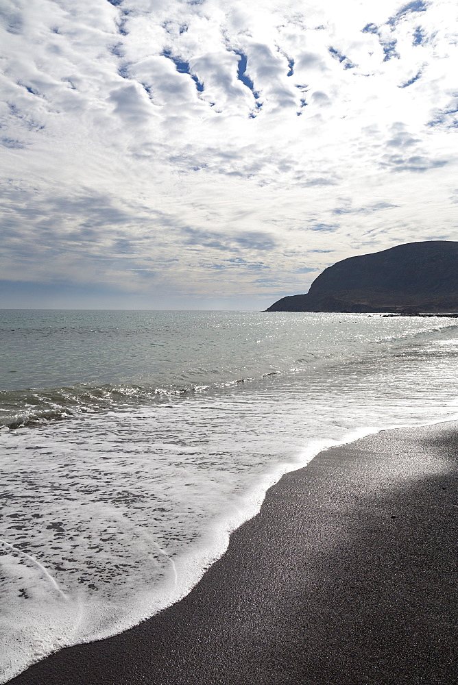 The dramatic black beach of Playa Pozo Negro on the volcanic island of Fuerteventura, Canary Islands, Spain, Atlantic, Europe