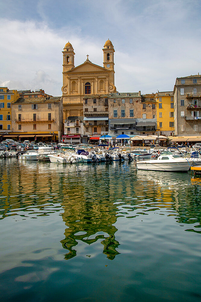 Boats moored in the port at Bastia with St. Jean Baptiste church, Bastia, Corsica, France, Mediterranean, Europe