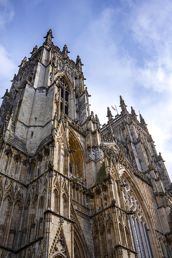 Looking up at the ornate facade and towers of York Minster in the ancient city of York, Yorkshire, United Kingdom