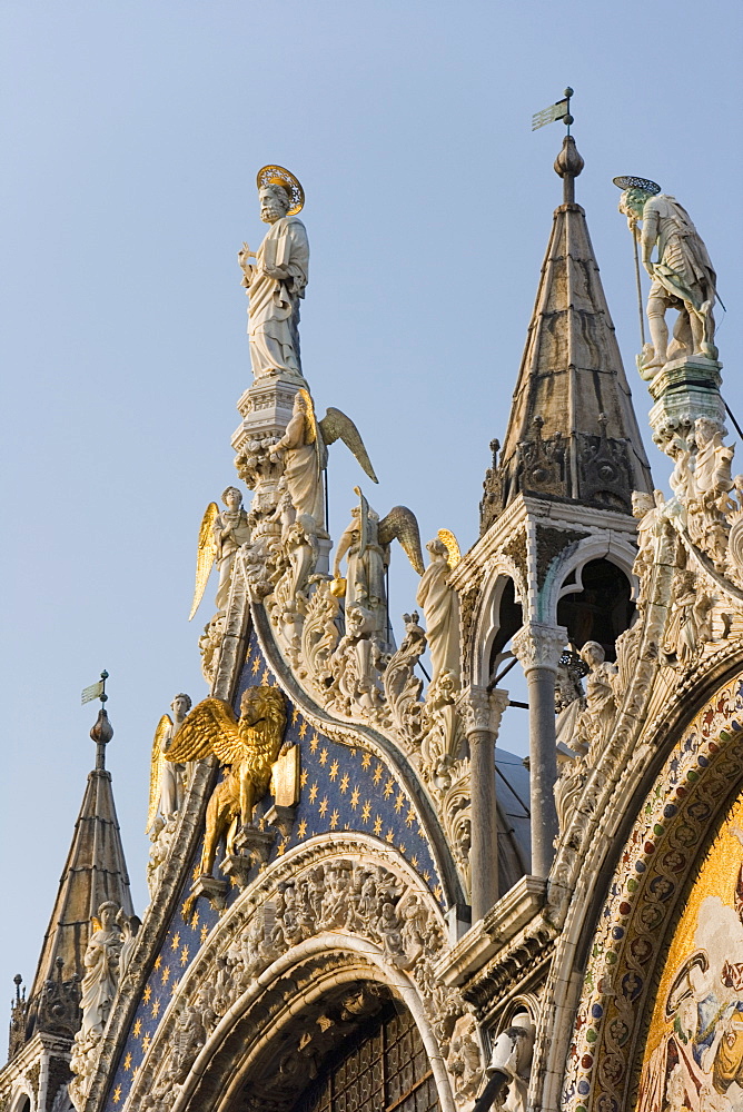 St. Mark and angels, detail of the facade of Basilica di San Marco (St. Mark's Basilica), St. Mark's Square, Venice, UNESCO World Heritage Site, Veneto, Italy, Europe