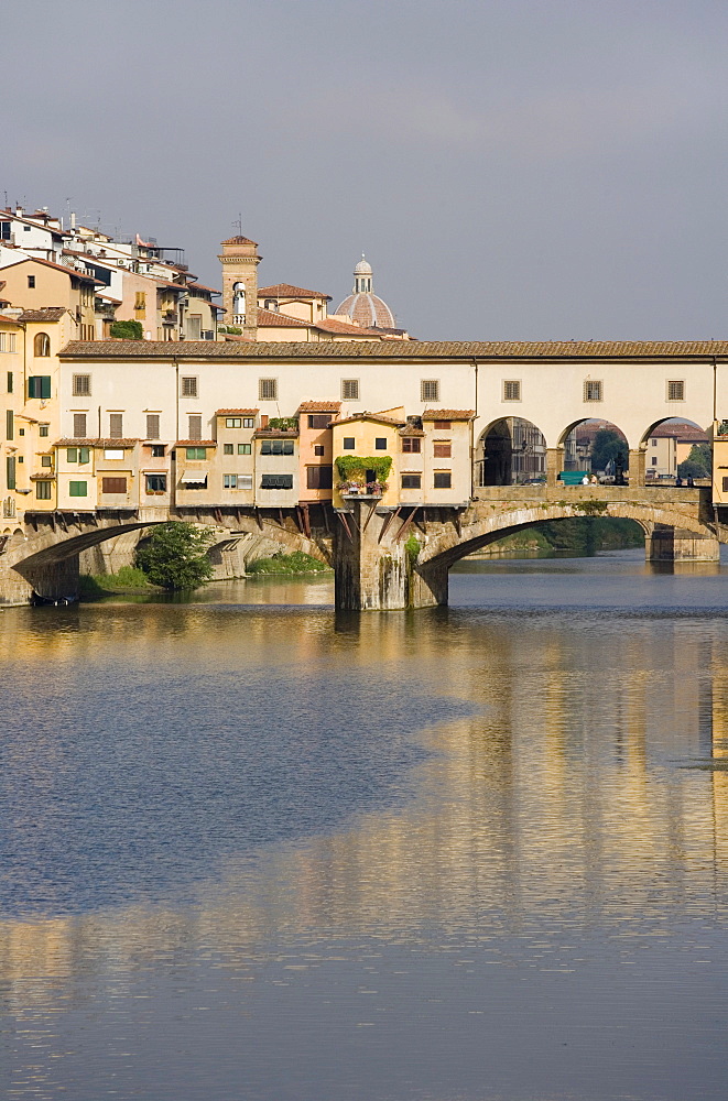 The Ponte Vecchio reflected in the river Arno in Florence, Tuscany, Italy