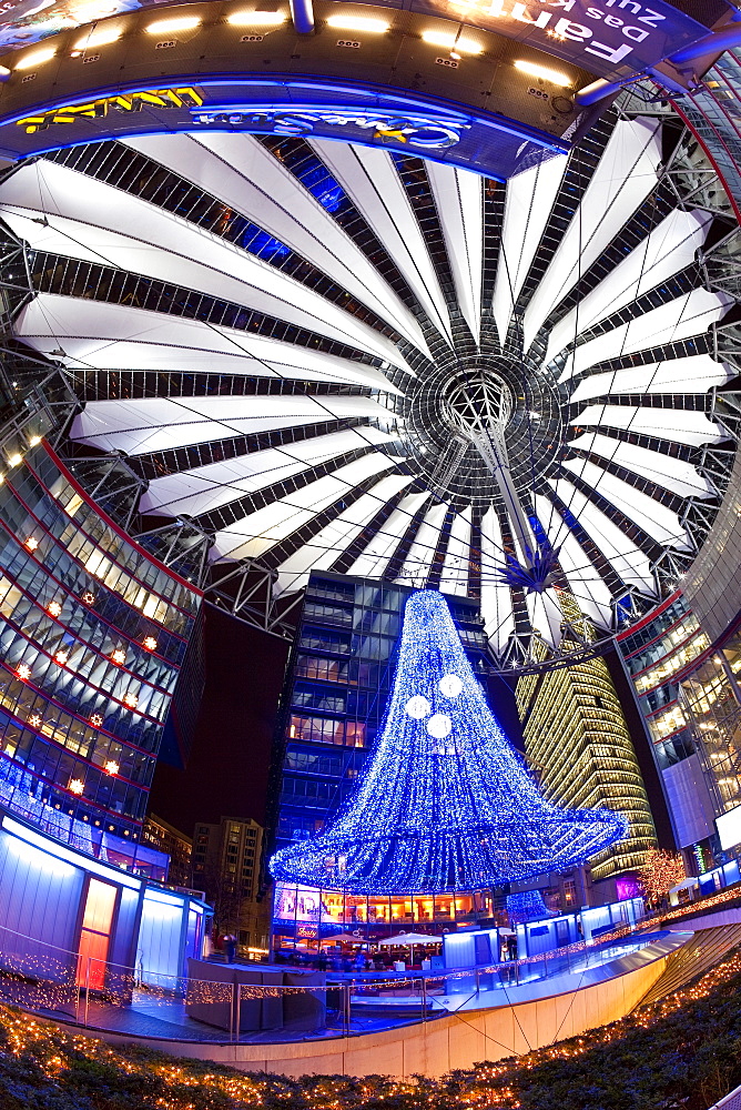 Futuristic design of the Sony Center in Potsdamer Platz, illuminated at Christmas, Berlin, Germany, Europe