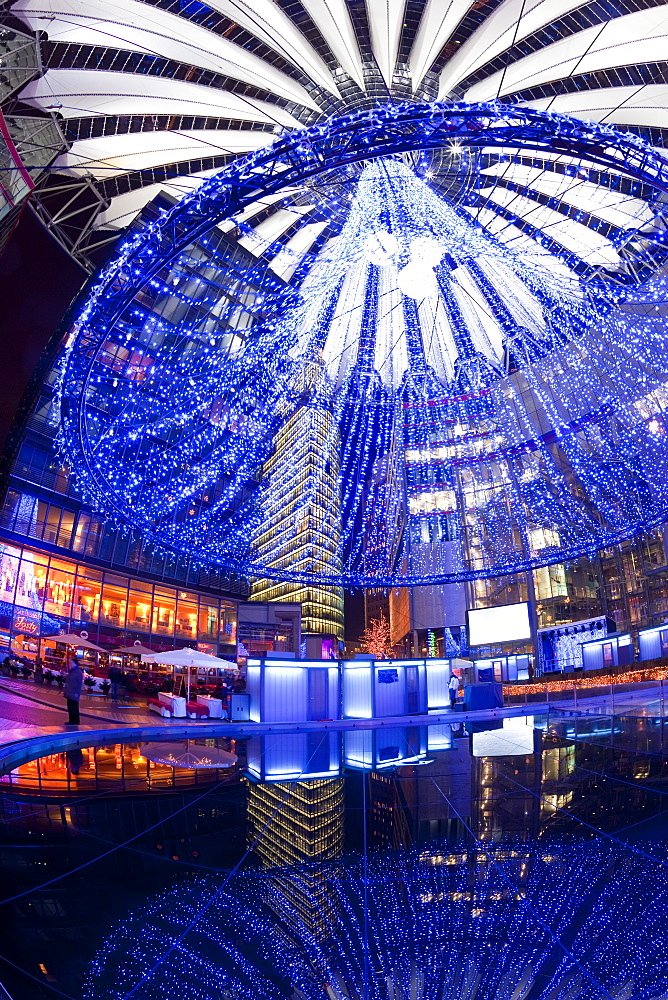 Futuristic design of the Sony Center in Potsdamer Platz, illuminated at Christmas, Berlin, Germany, Europe