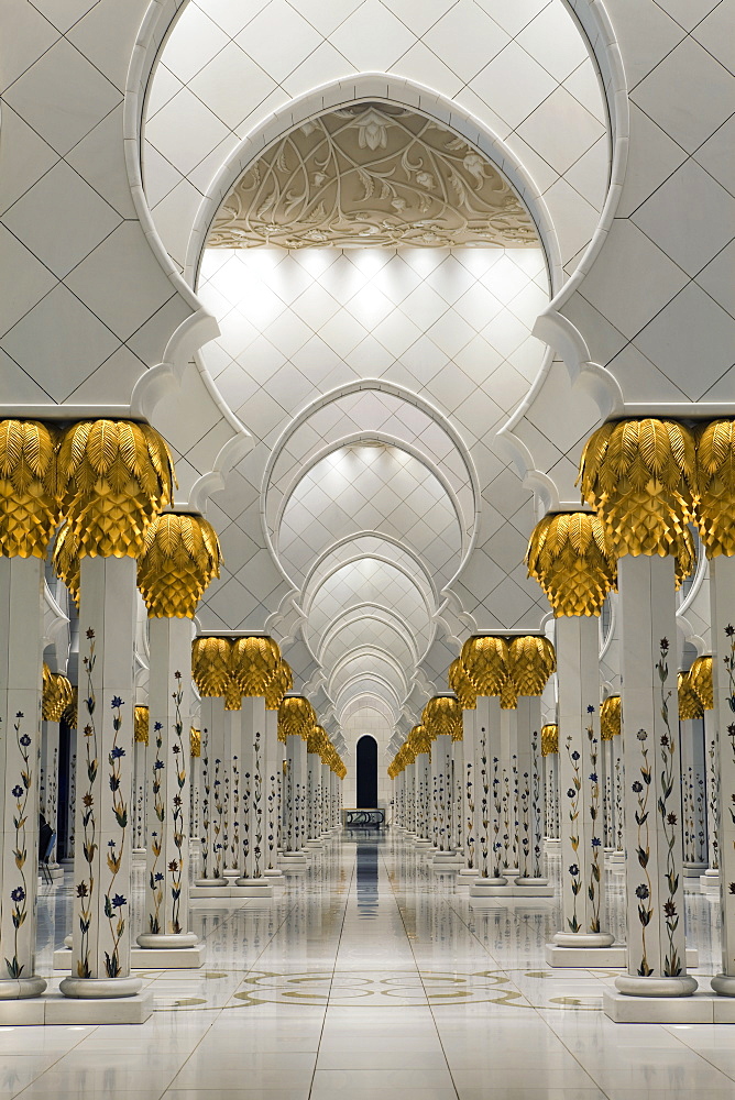 Gilded columns leading to the main prayer hall of Sheikh Zayed Bin Sultan Al Nahyan Mosque, Abu Dhabi, United Arab Emirates, Middle East