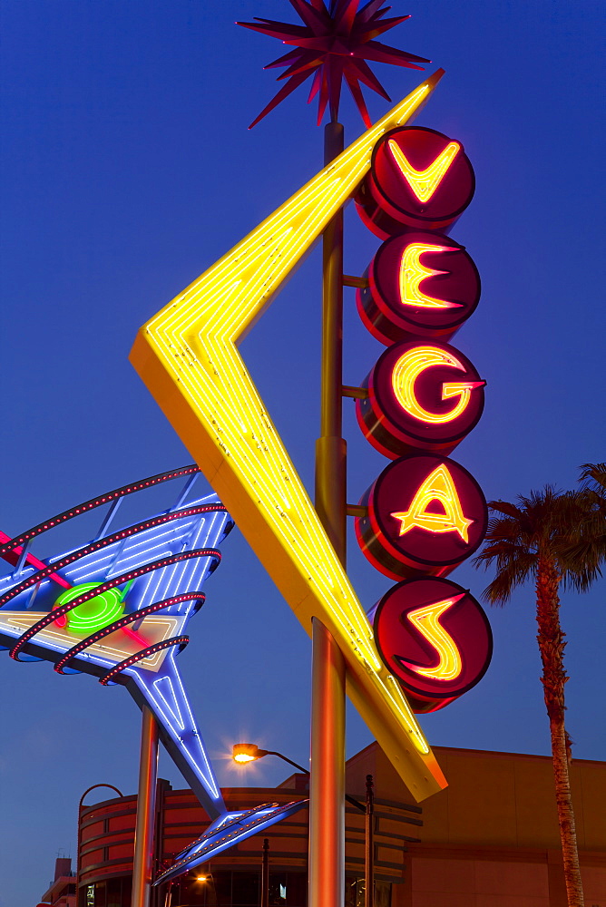 Neon Vegas sign at dusk, Downtown, Freemont East Area, Las Vegas, Nevada, United States of America, North America