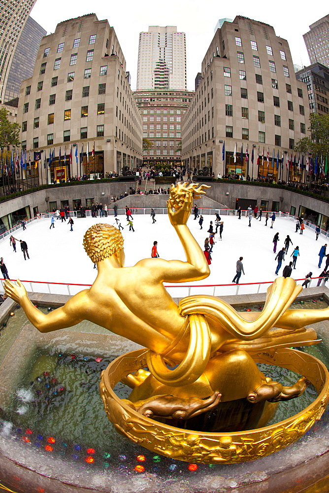 Ice skating rink below the Rockefeller Centre building on Fifth Avenue, New York City, New York, United States of America, North America