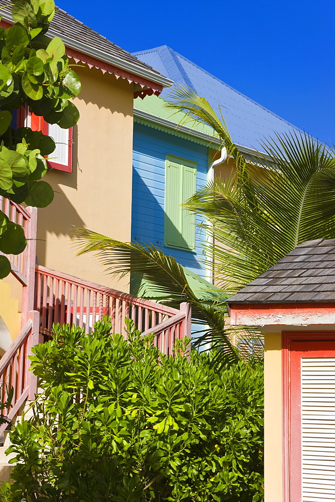 Colourfully painted buildings at Orient Beach, St. Martin (St. Maarten), Leeward Islands, West Indies, Caribbean, Central America