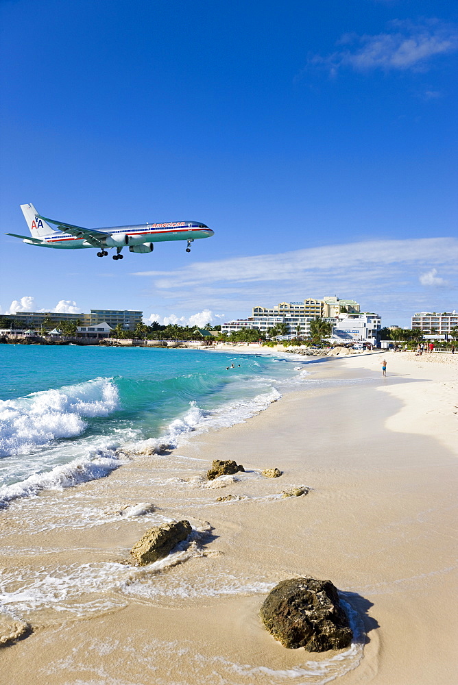 Beach at Maho Bay and low flying aircraft approaching the runway of Princess Juliana International airport, St. Martin (St. Maarten), Leeward Islands, West Indies, Caribbean, Central America