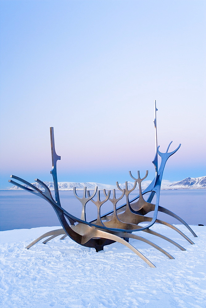 Looking towards snow capped mountains in the distance, Reykjavik, Iceland, Polar Regions