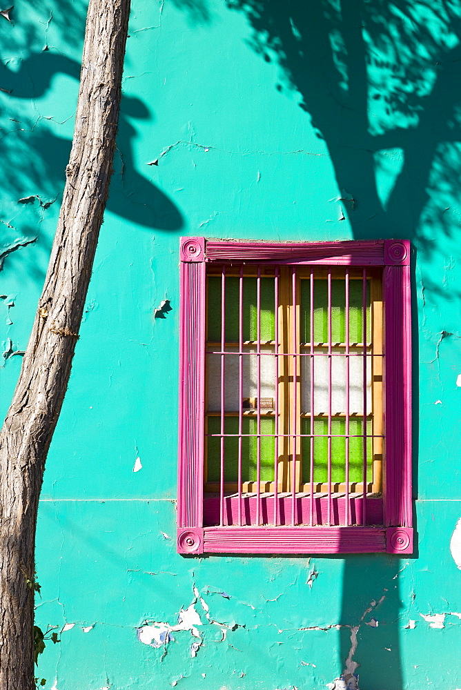 Colourfully painted housefronts in the trendy district of Barrio Bellavista, Santiago, Chile, South America