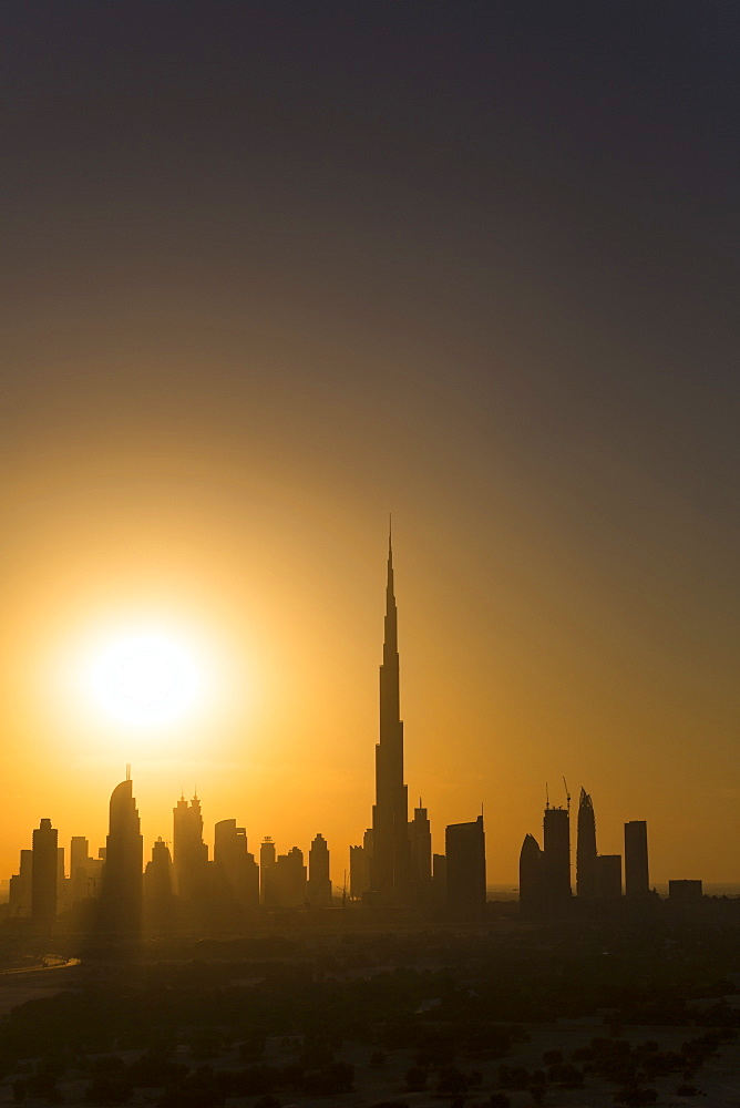 Elevated view of the new Dubai skyline, the Burj Khalifa, modern architecture and skyscrapers on Sheikh Zayed Road, Dubai, United Arab Emirates, Middle East