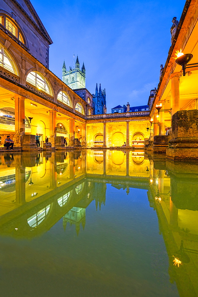 The Roman Baths and Bath Abbey illuminated at dusk, UNESCO World Heritage Site, Bath, Somerset, England, United Kingdom, Europe