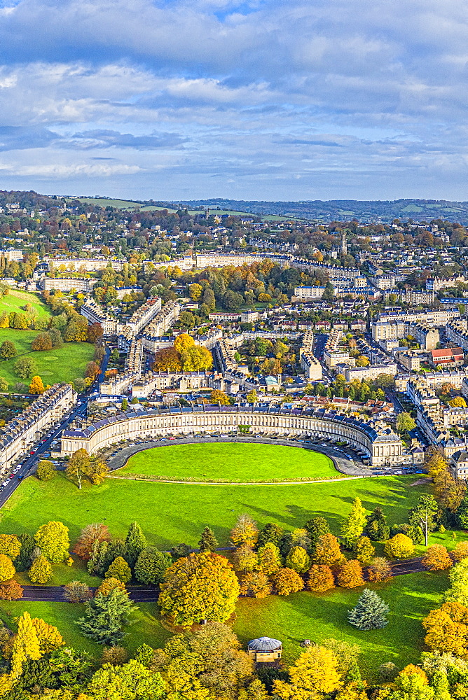 Aerial view by drone over the Georgian city of Bath, Royal Victoria Park and Royal Cresent, UNESCO World Heritage Site, Bath, Somerset, England, United Kingdom, Europe