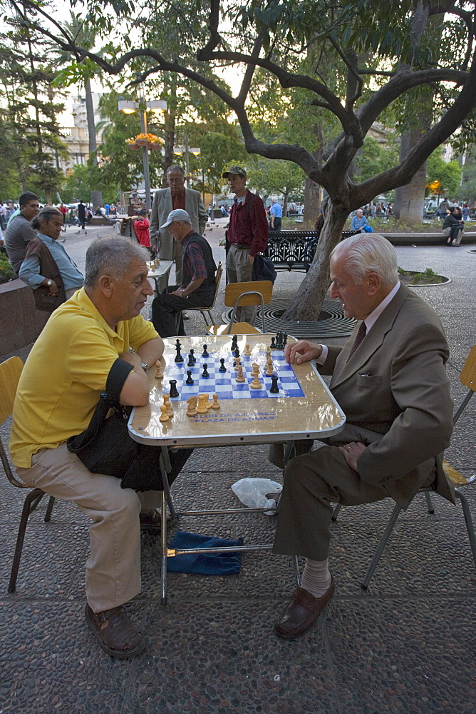 Men playing chess in Plaza de Armas, Santiago, Chile, South America