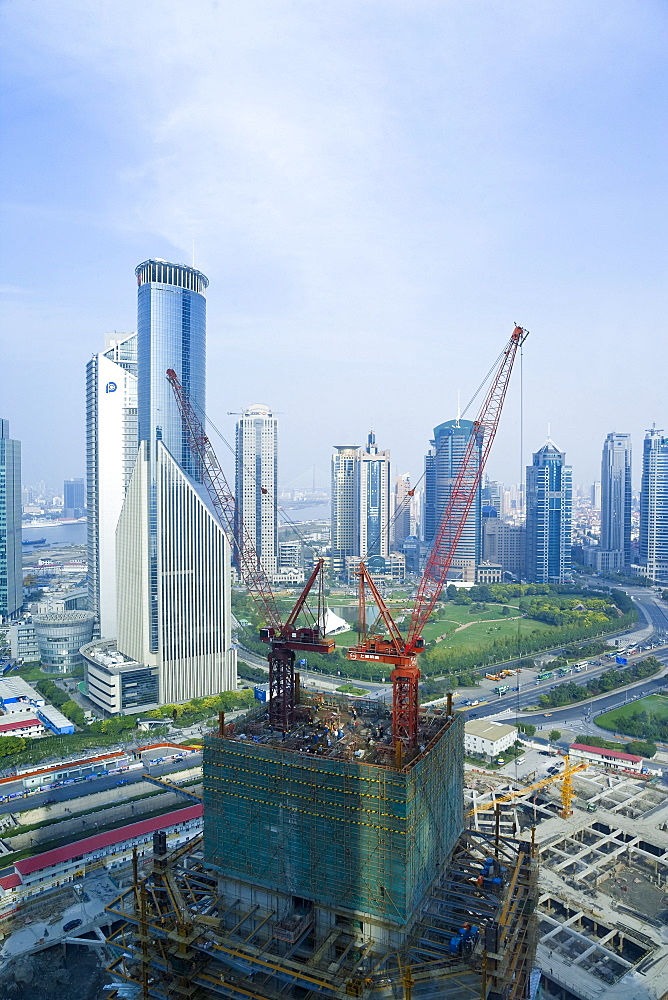 Modern skyscrapers and new construction in the Lujiazui financial district of Pudong, Shanghai, China, Asia