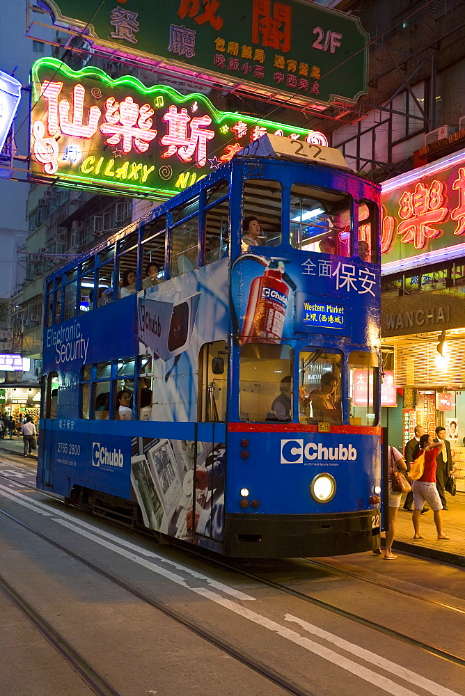 Brightly coloured trams running between Central and Wan Chai, Wan Chai, Hong Kong Island, Hong Kong, China, Asia