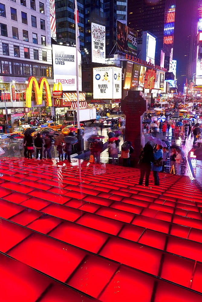 Neon lights on a rainy night, Times Square, Manhattan, New York City, New York, United States of America, North America