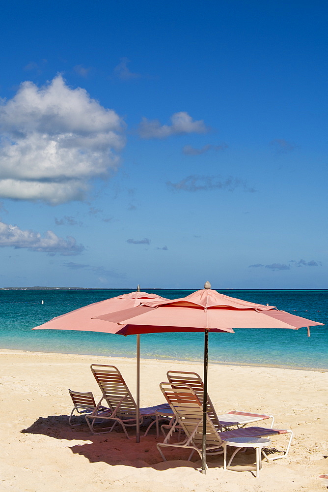 Beach umbrellas on Grace Bay Beach, Providenciales, Turks and Caicos Islands, West Indies, Central America