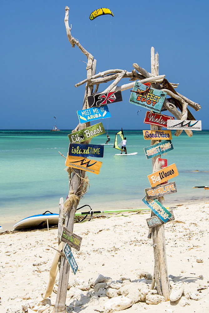 Windsurfing and signs at Hadicurari Beach, Aruba, ABC Islands, Dutch Antilles, Caribbean, Central America