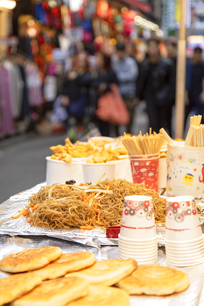 Fried noodles in Myeongdong market, Seoul, South Korea, Asia