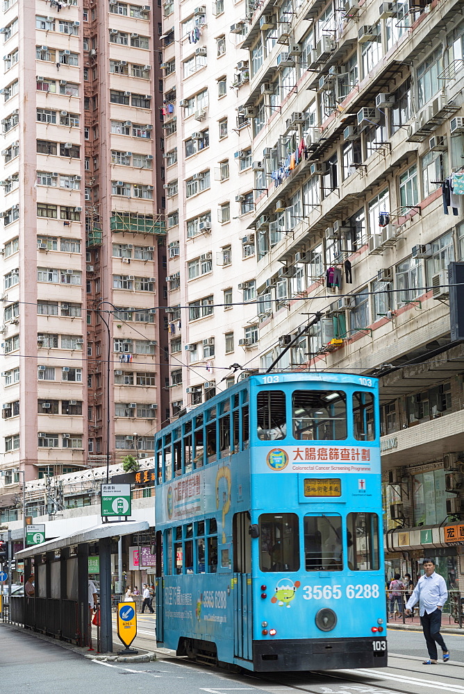 Trams at tram stop, Sai Ying Pun, Hong Kong Island, Hong Kong, China, Asia