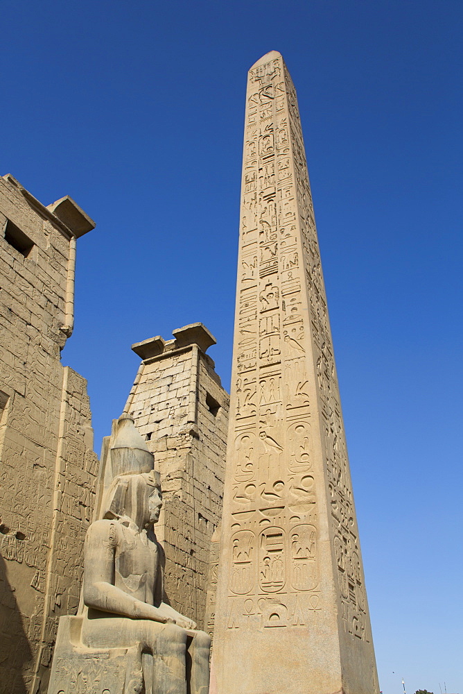 Colossus of Ramses II in front of Pylon, Obelisk, Luxor Temple, UNESCO World Heritage Site, Luxor, Thebes, Egypt, North Africa, Africa