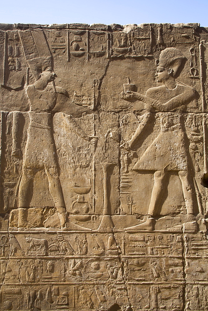 Pharaoh on right, God Amun on the left, Bas Relief, Luxor Temple, UNESCO World Heritage Site, Luxor, Thebes, Egypt, North Africa, Africa