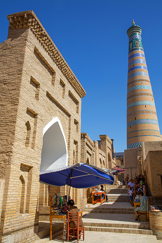 Shopping Street, Islam Khoja Minaret in the background, Ichon Qala (Itchan Kala), UNESCO World Heritage Site, Khiva, Uzbekistan, Central Asia, Asia